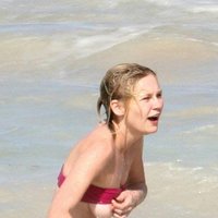 Celebrities fuck like pornstars! - Kirsten Dunst tits on beach