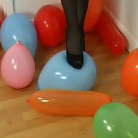 Bursting balloons in stockings and heels